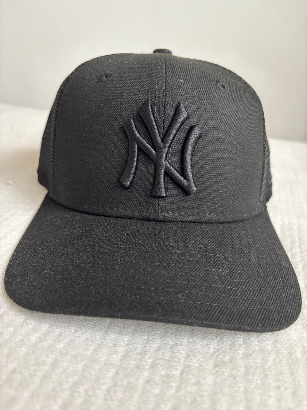 New Era Black NY Logo Trucker Cap